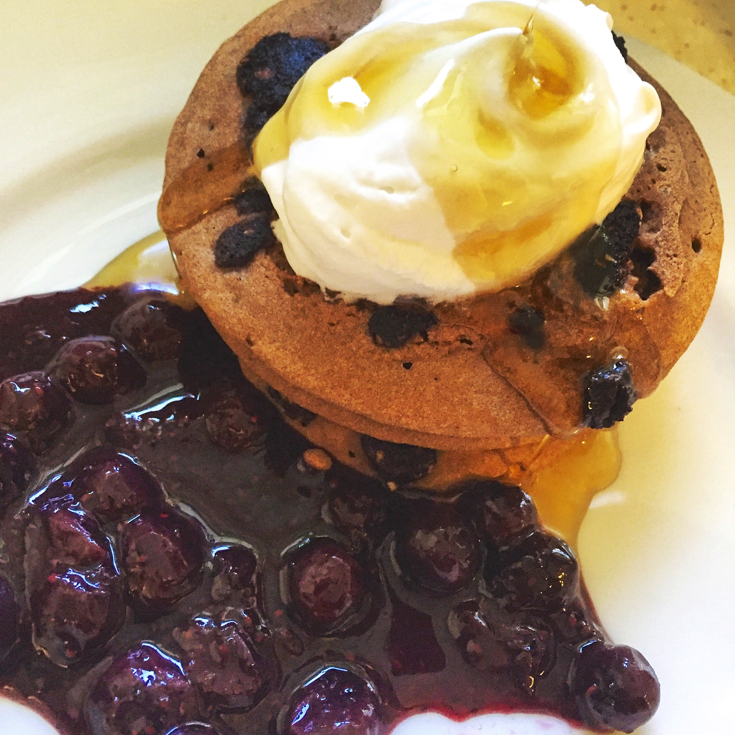 Teff Flour Pancakes with Blueberry-Chia Seed Compote & Coconut Whipped Cream